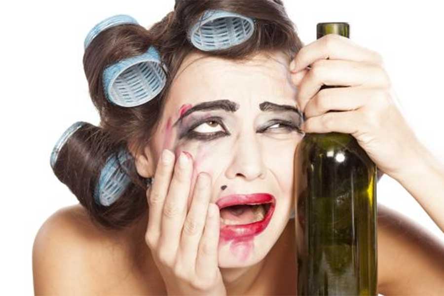 Girl stressed wine bottle
